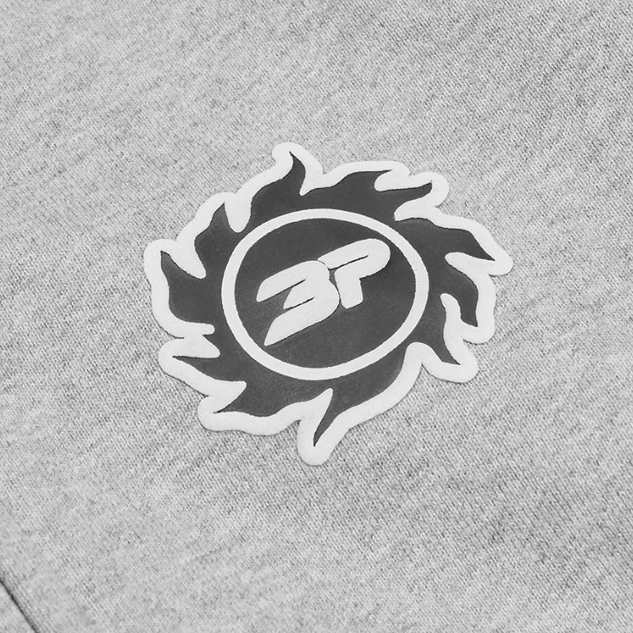 Logo view of Broken Planet Sun Heather Grey Zip-Up Hoodie